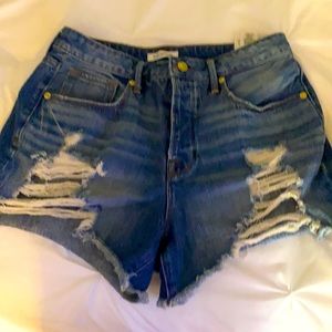 COPY - Good America button fly shorts.